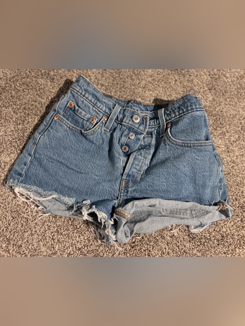 Levi’s 501 High-Rise Raw Hem Denim Shorts in Blue